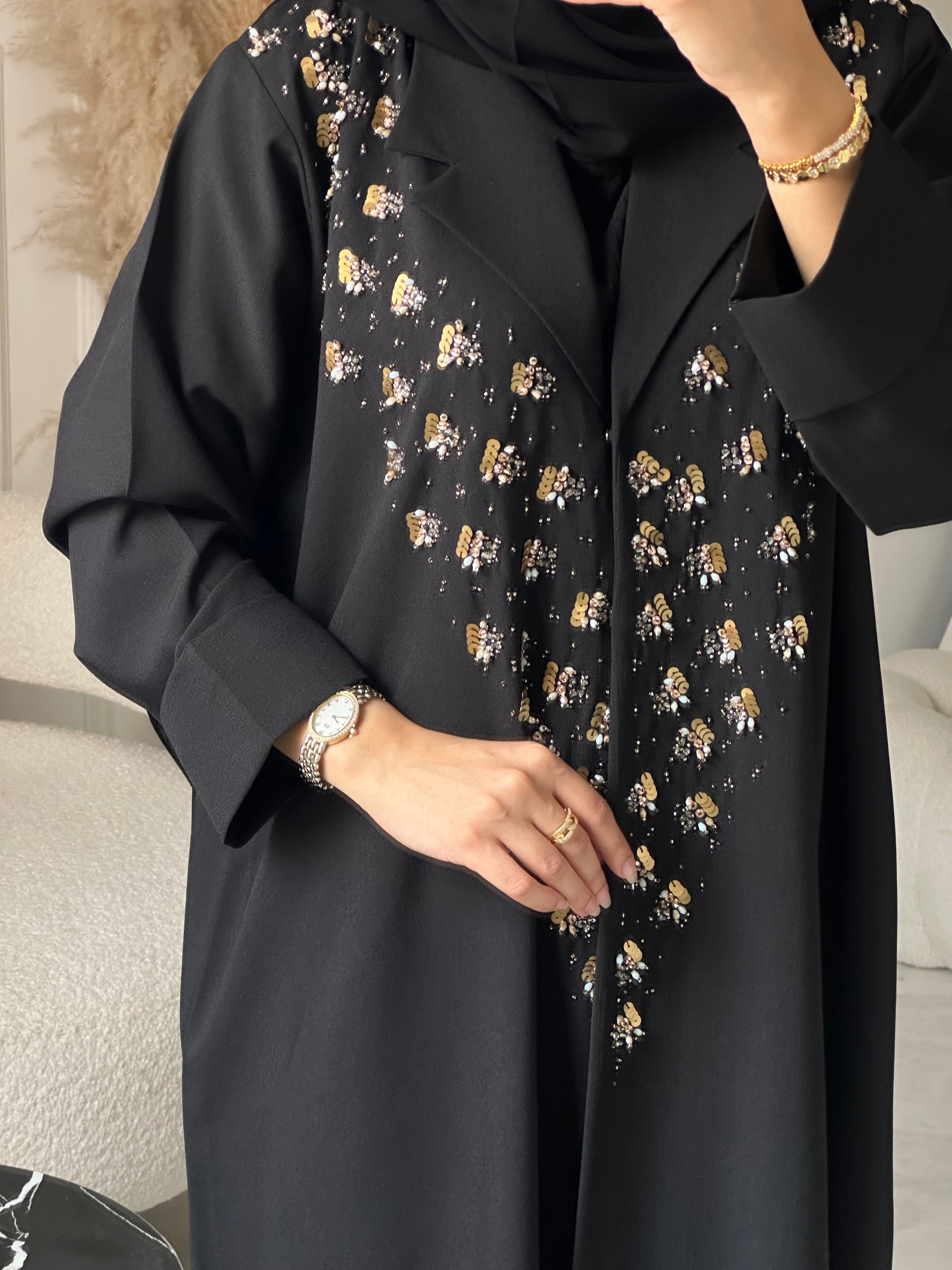 C 0929 عباية عيد سوداء مطرزة بالخرز