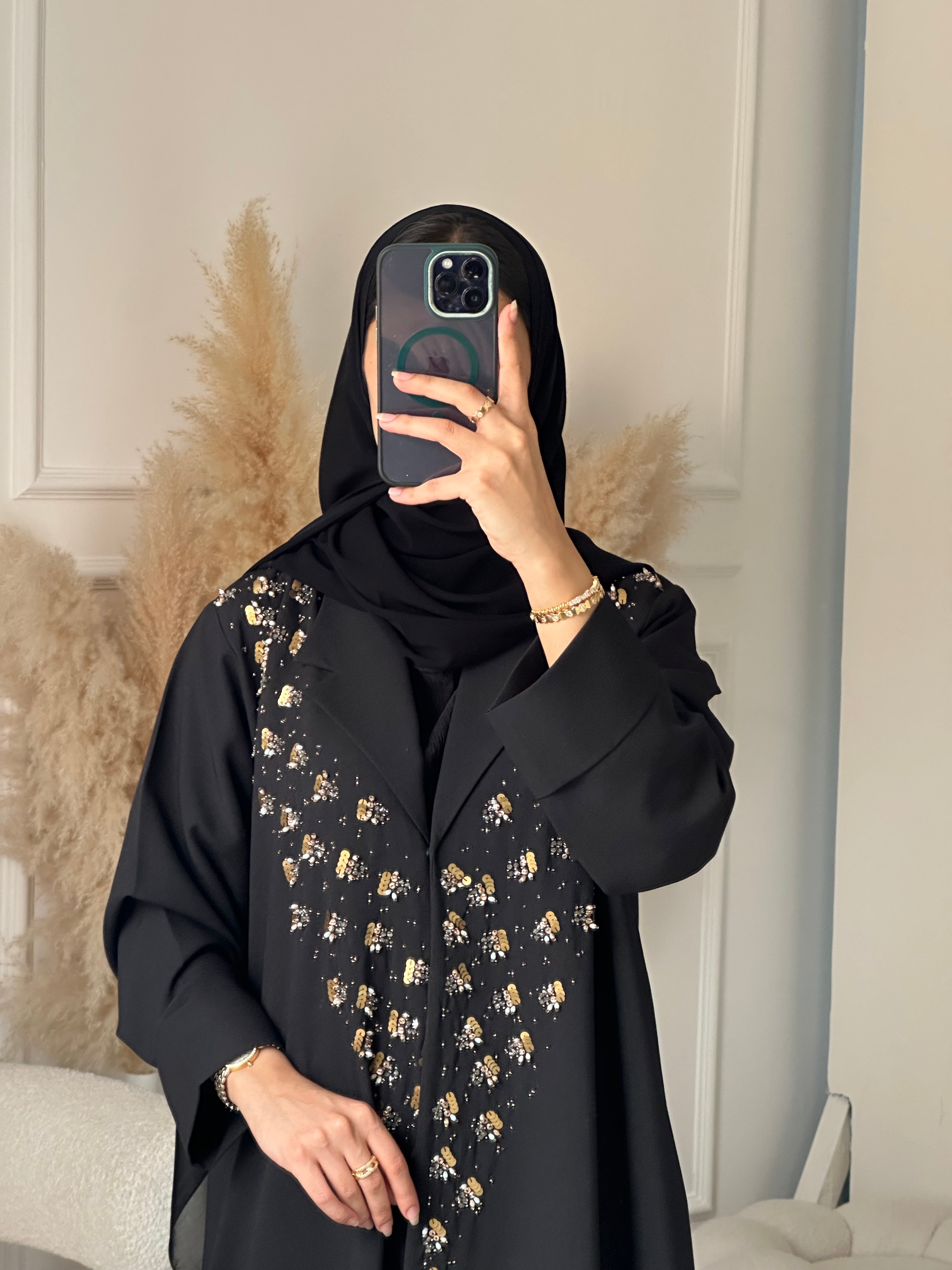 C 0929 عباية عيد سوداء مطرزة بالخرز