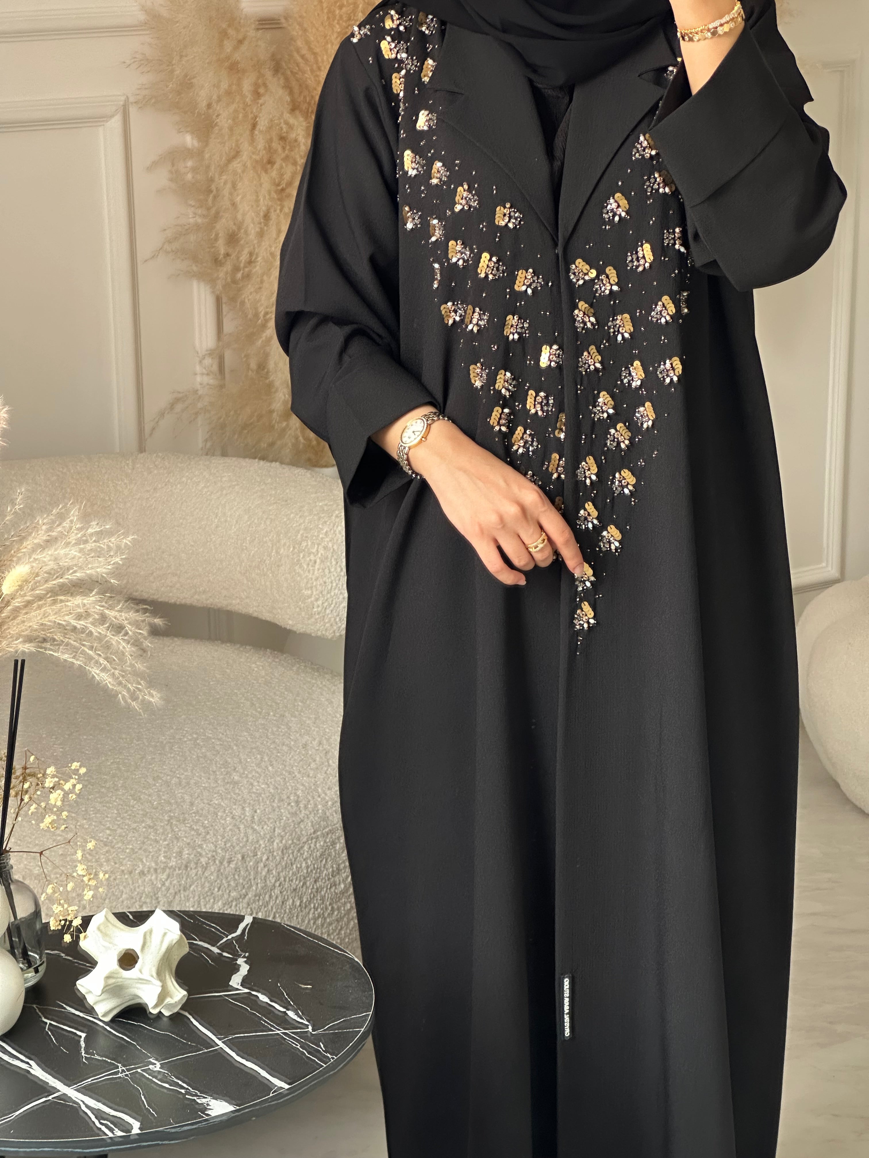 C 0929 عباية عيد سوداء مطرزة بالخرز