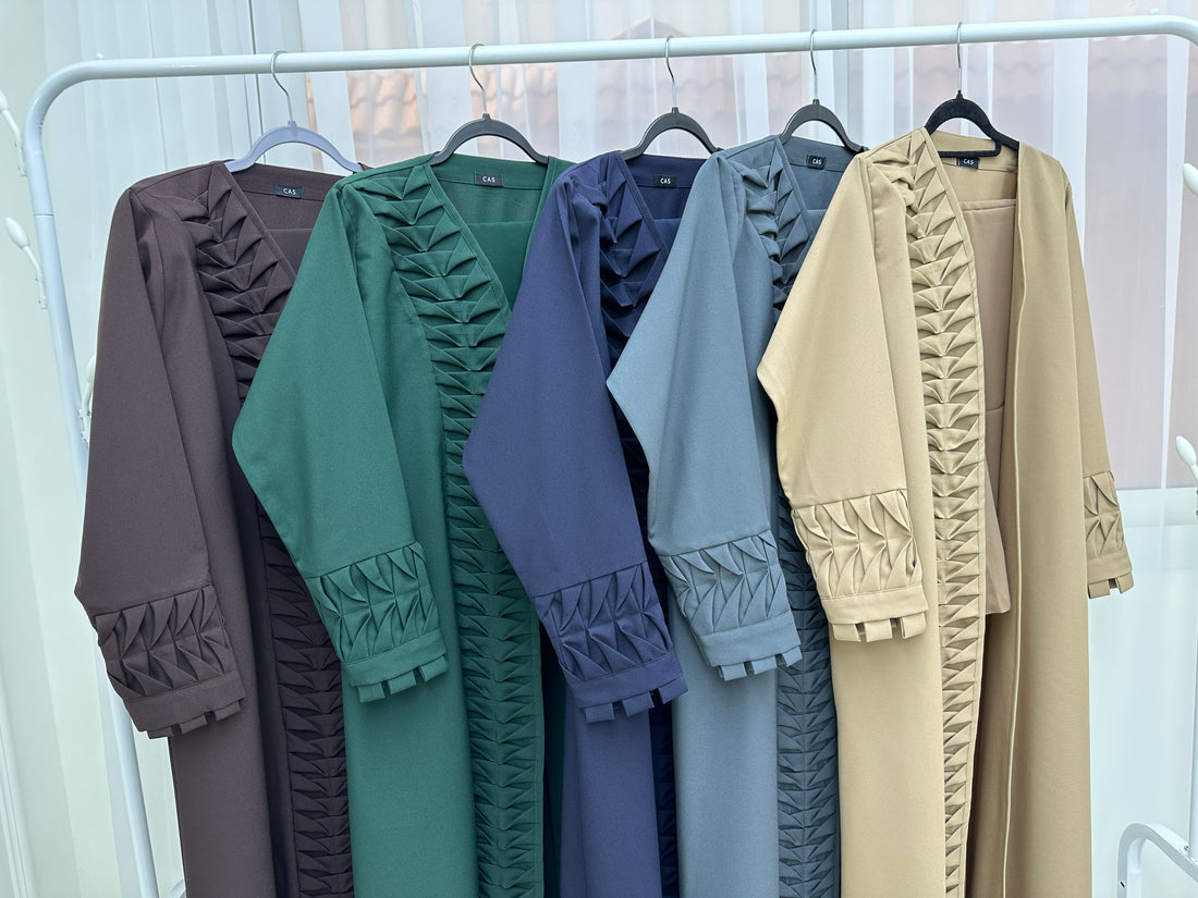 What are the different types of abayas available, and how do they vary in style and design?