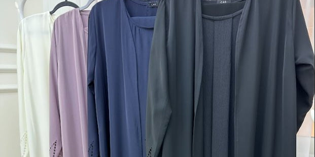 What are the popular abaya fabrics and colors in the UAE - Crystal Abaya Studio