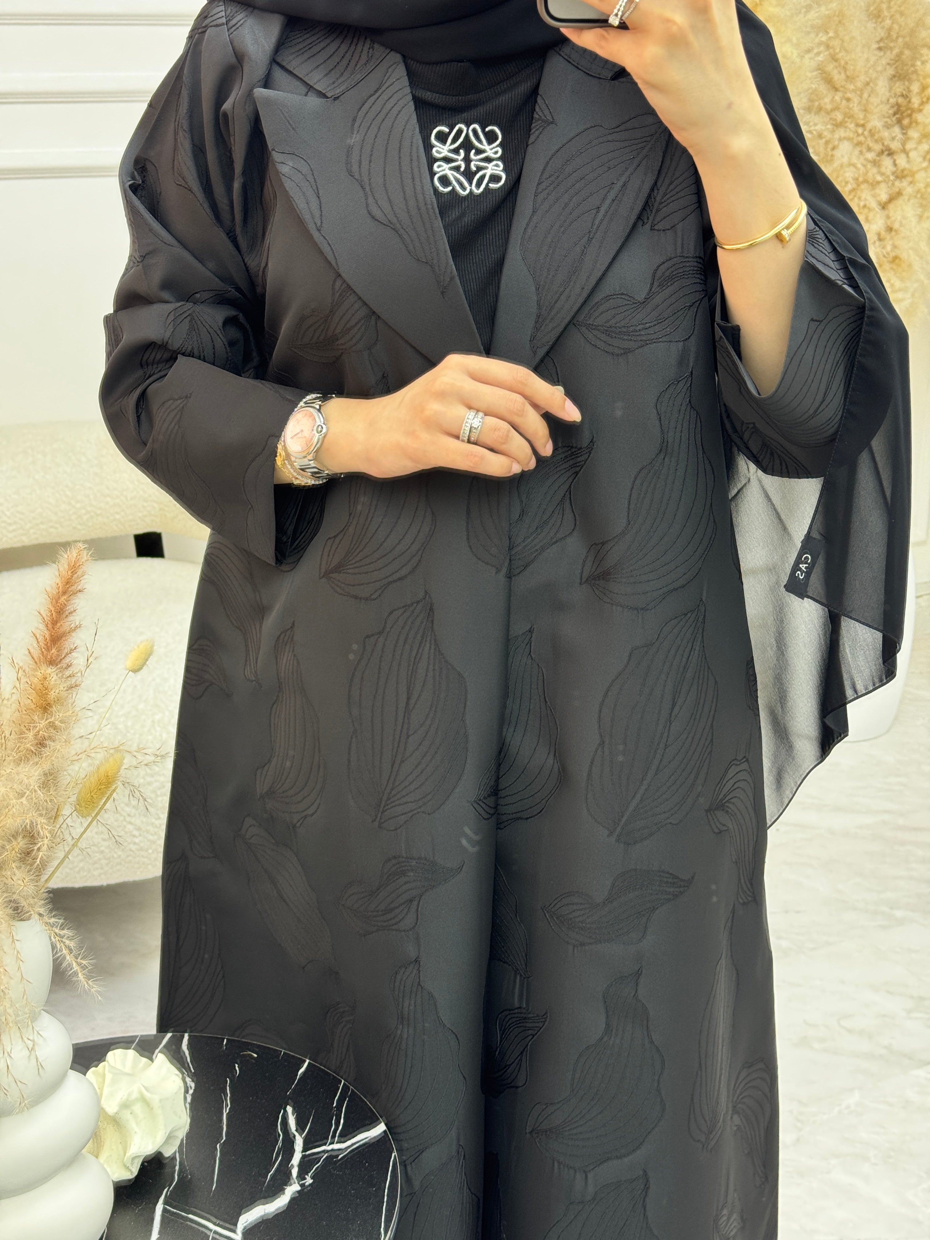 Black_abaya_cab783e8-ac16-4baa-9fb0-10cf38424e5c.jpg