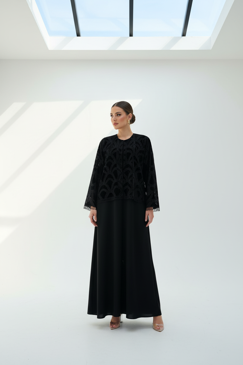 Arab model in printed velvet abaya
