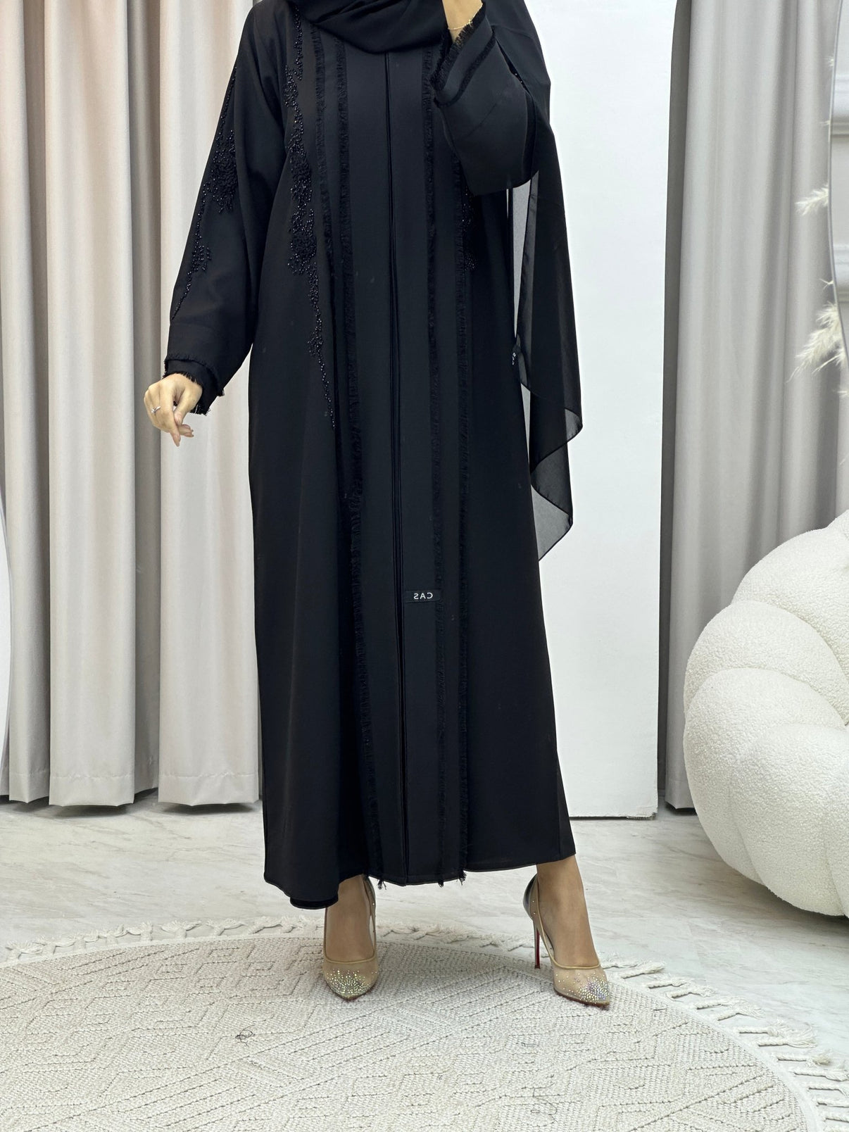 Off white and black drape outfit with black mat sequins handwork detailing on dress combined with black satin drape skirt