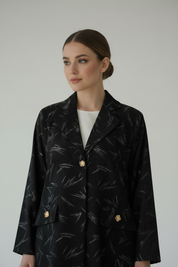 Closeup of Arab model in black velvet abaya