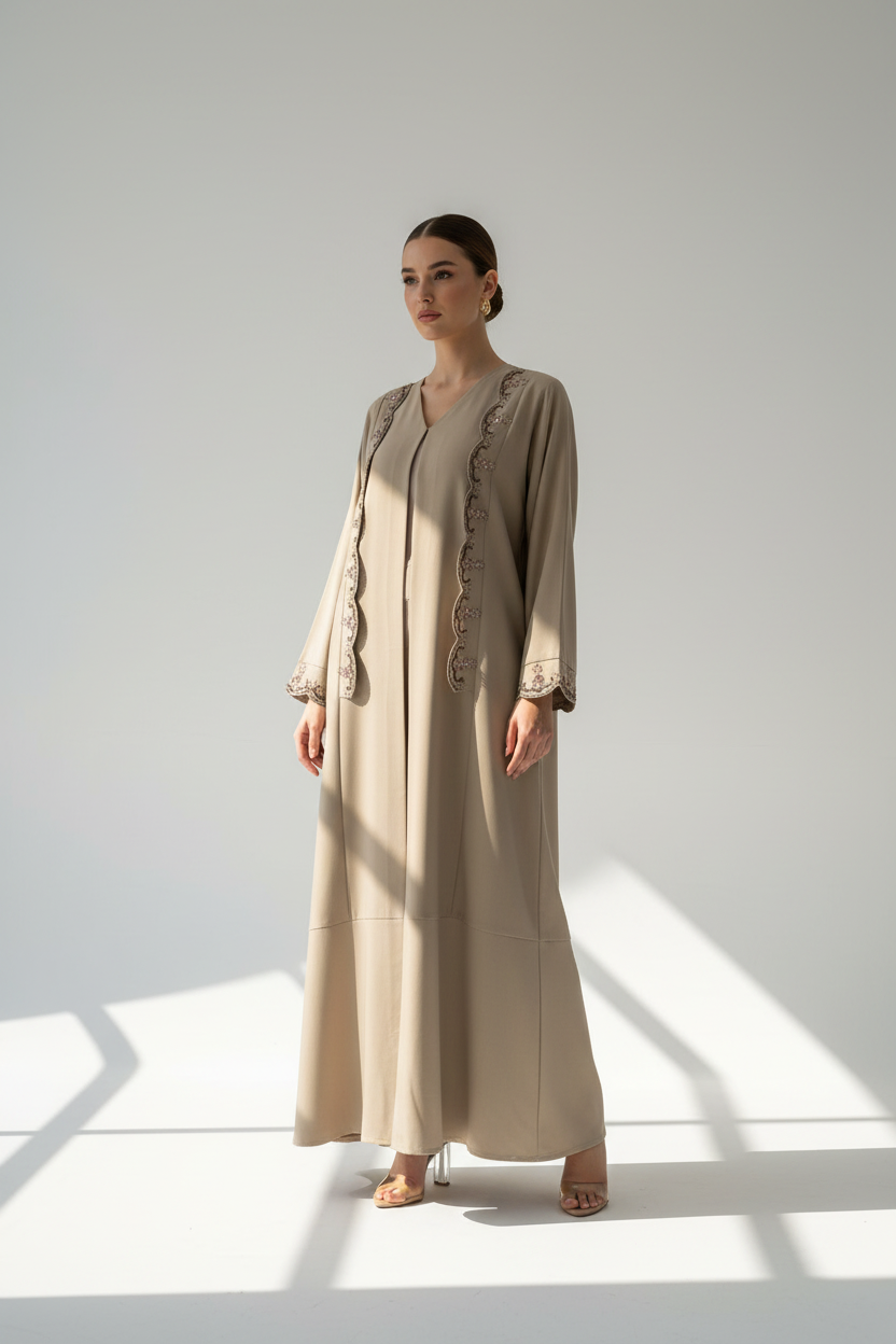 full-body-shot-of-arab-model-in-beige-embroidered-abaya-with-plain-hem.png